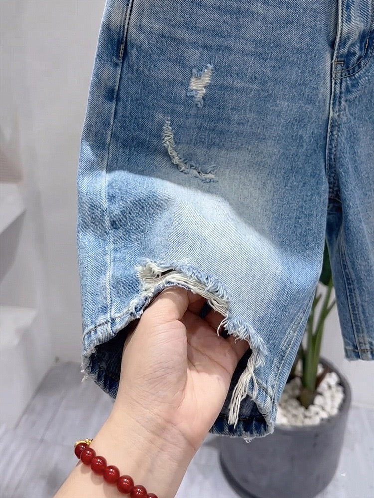 Vintage Light Blue Ripped Denim Shorts